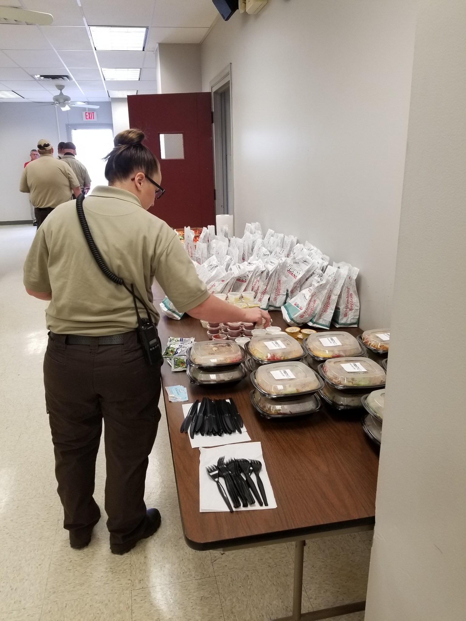 Cabell County EMS workers enjoy a boxed lunch, courtesy of AT&T and FirstNet.